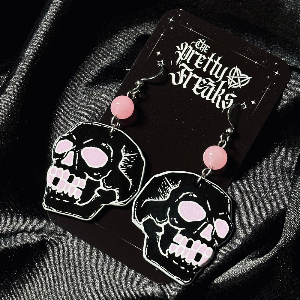 
                      
                        Pink Skull Earrings
                      
                    