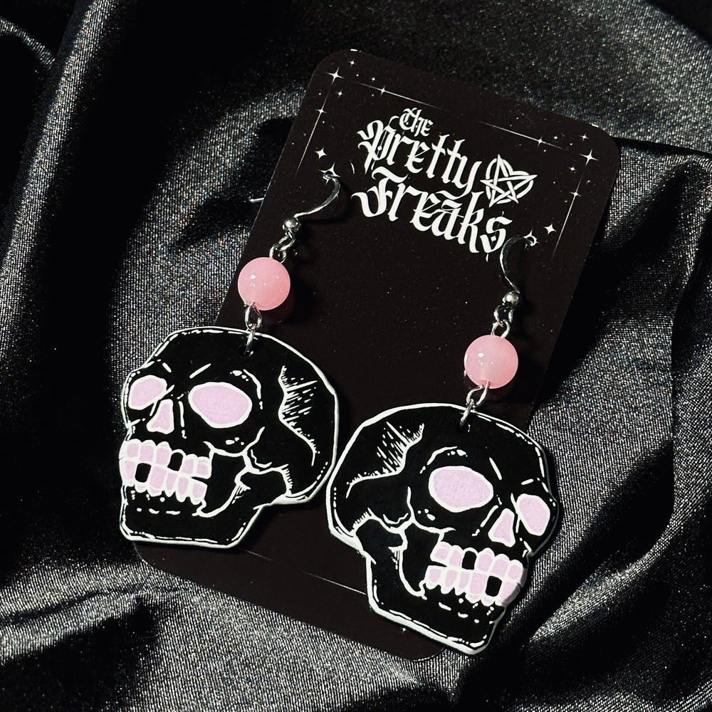 
                      
                        Pink Skull Earrings
                      
                    