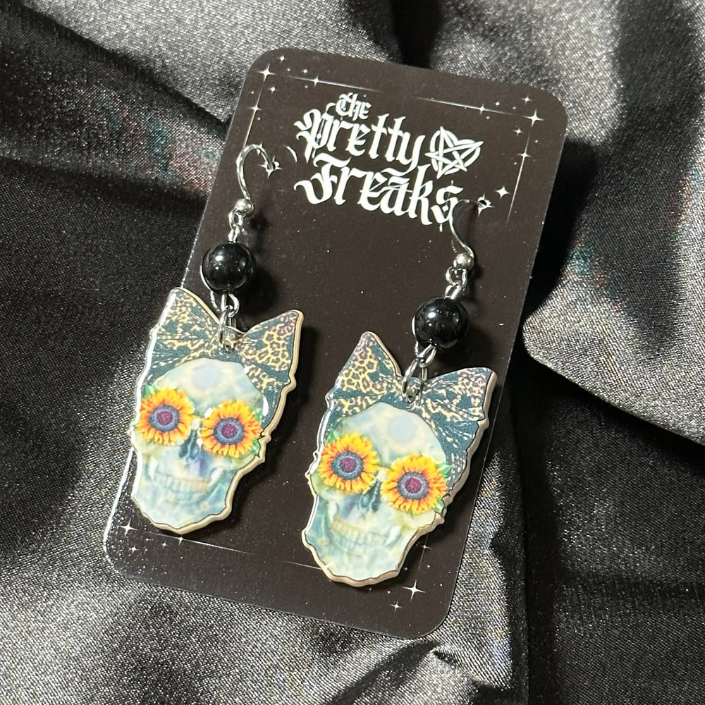 
                      
                        Skull Sunflower Dangle Earrings
                      
                    