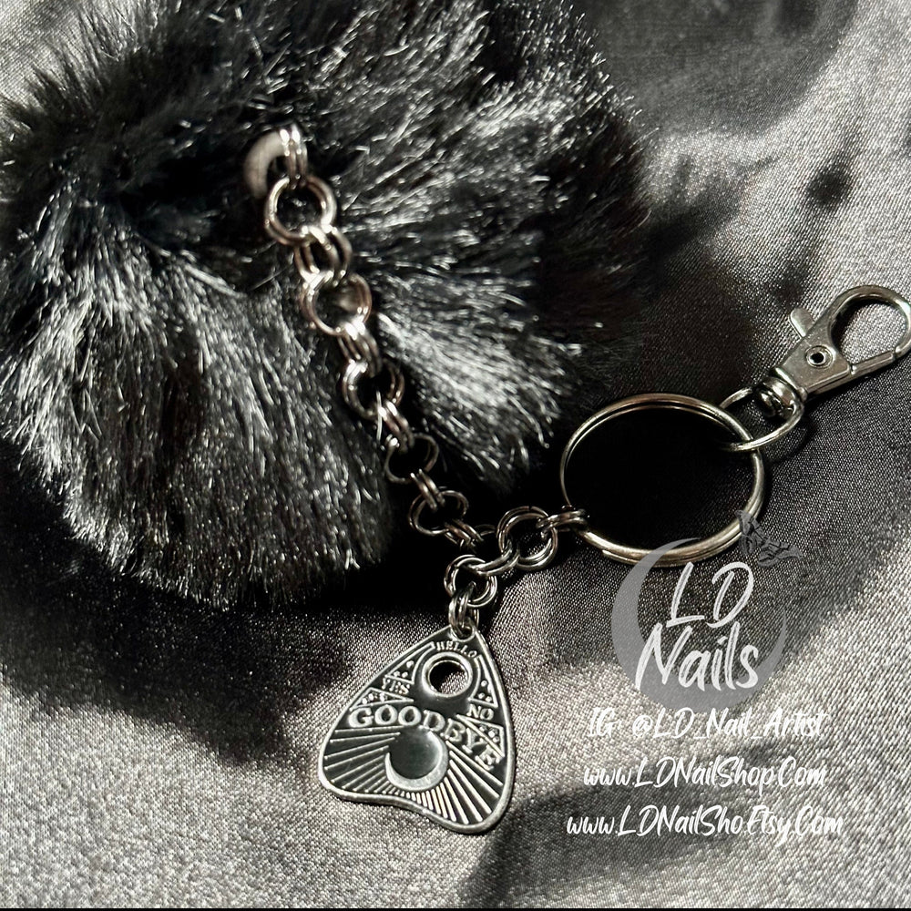 
                      
                        Gothic Ouija Planchette Faux Fur Keychain
                      
                    