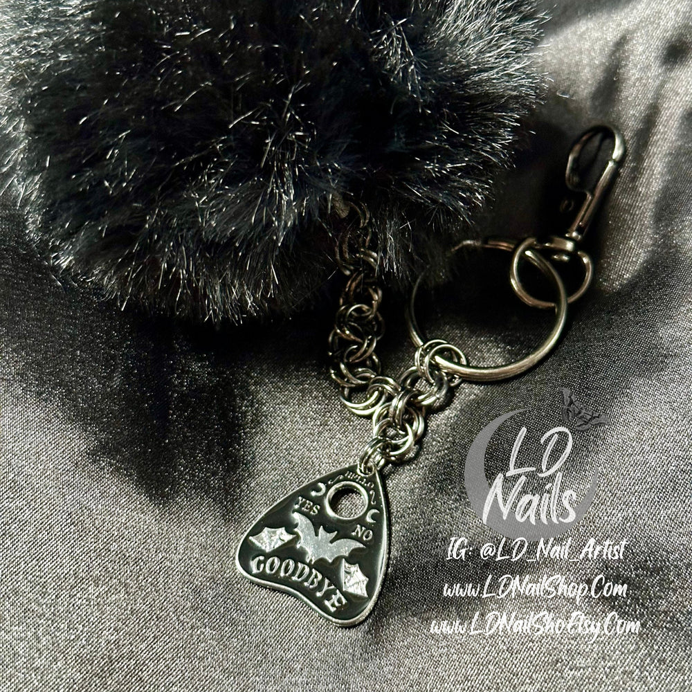 
                      
                        Gothic Ouija Planchette Faux Fur Keychain
                      
                    